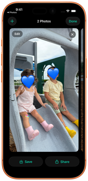 A photo in the Photos app with two children's faces automatically covered by blue heart emoji